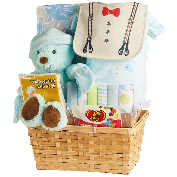 Blue baby gift basket with teddy bear, baby clothes, book, sweets, and receiving blanket