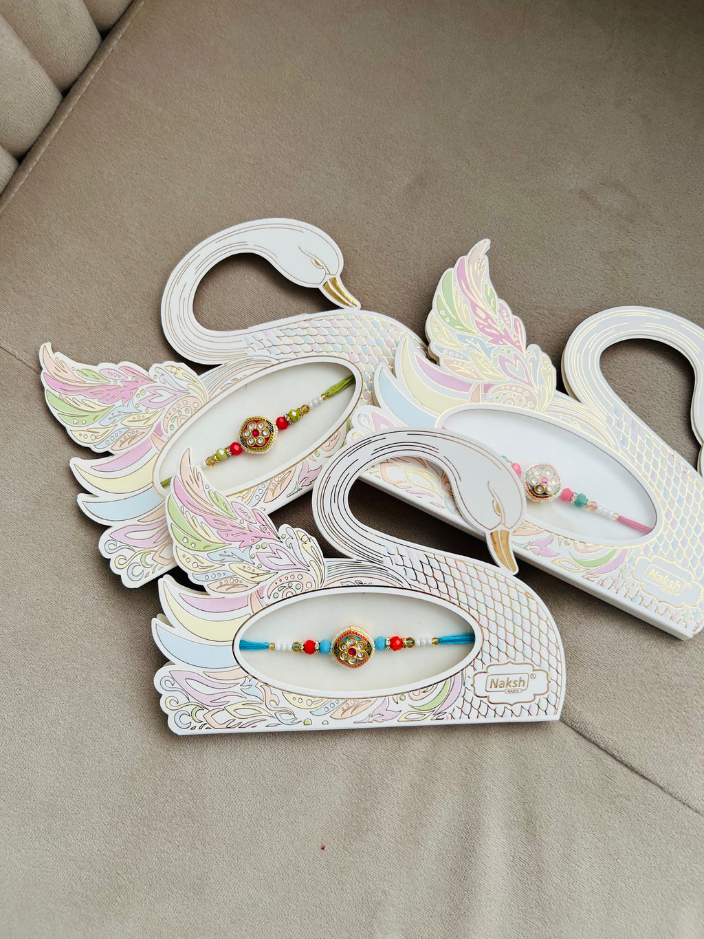 Designer Kundan Rakhi – Intricate Centerpiece, Premium Beads & Swan Gift Card