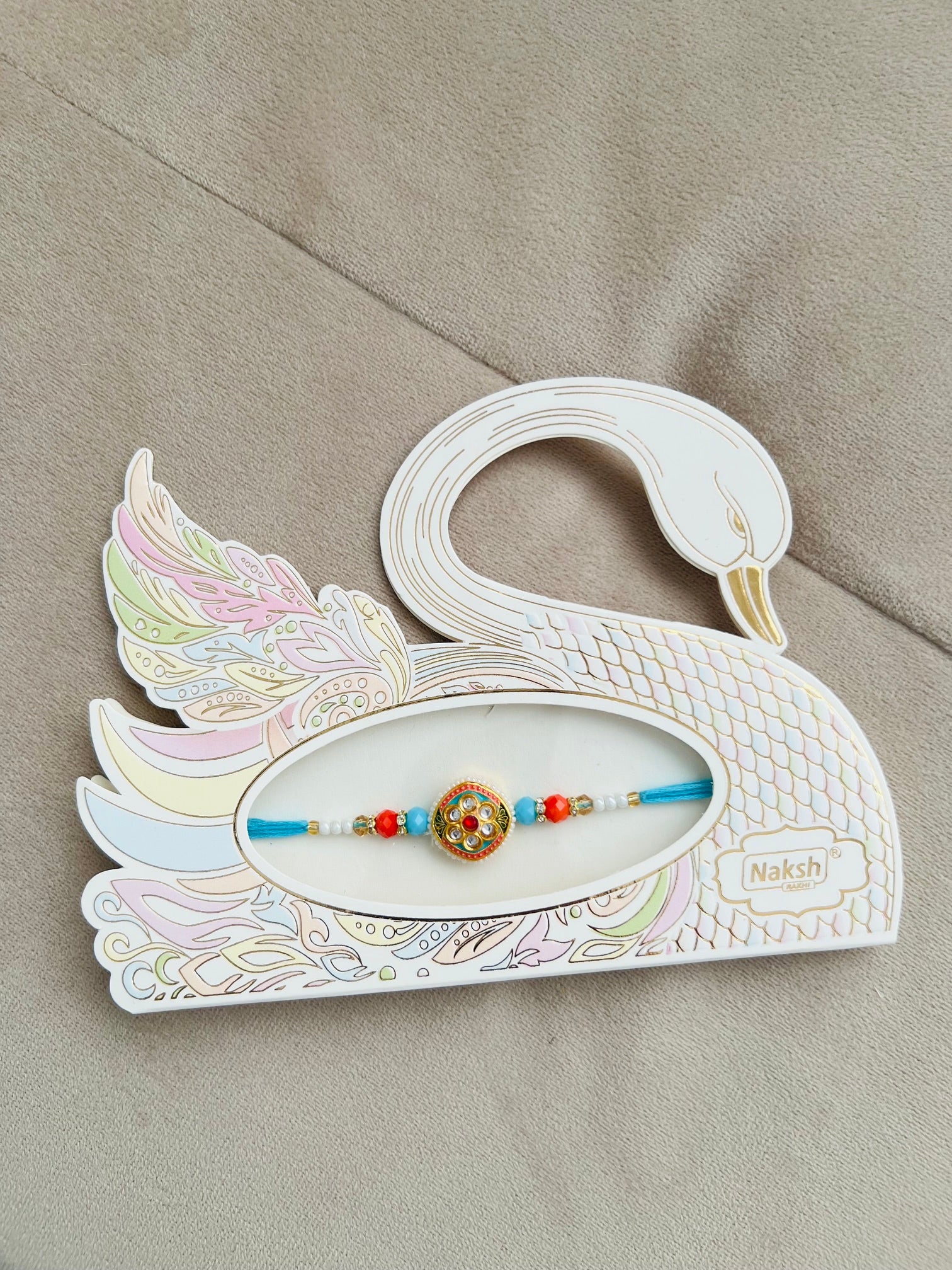 Designer Kundan Rakhi – Intricate Centerpiece, Premium Beads & Swan Gift Card