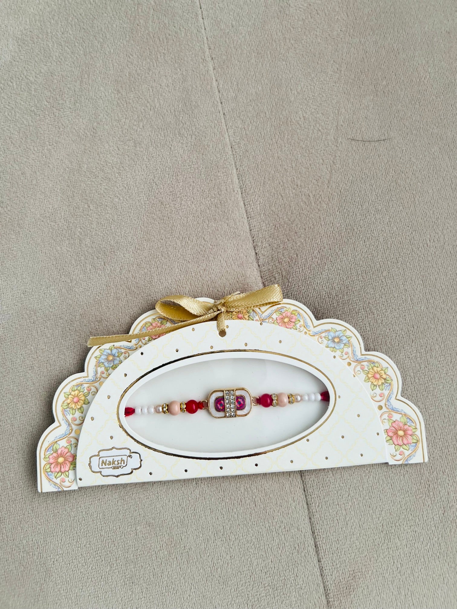 Designer Stone Rakhi – Rectangular Centerpiece, Premium Beads