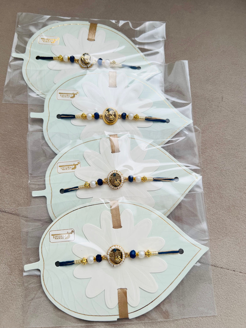 Krishna Rakhi – Elegant Leaf Card Edition