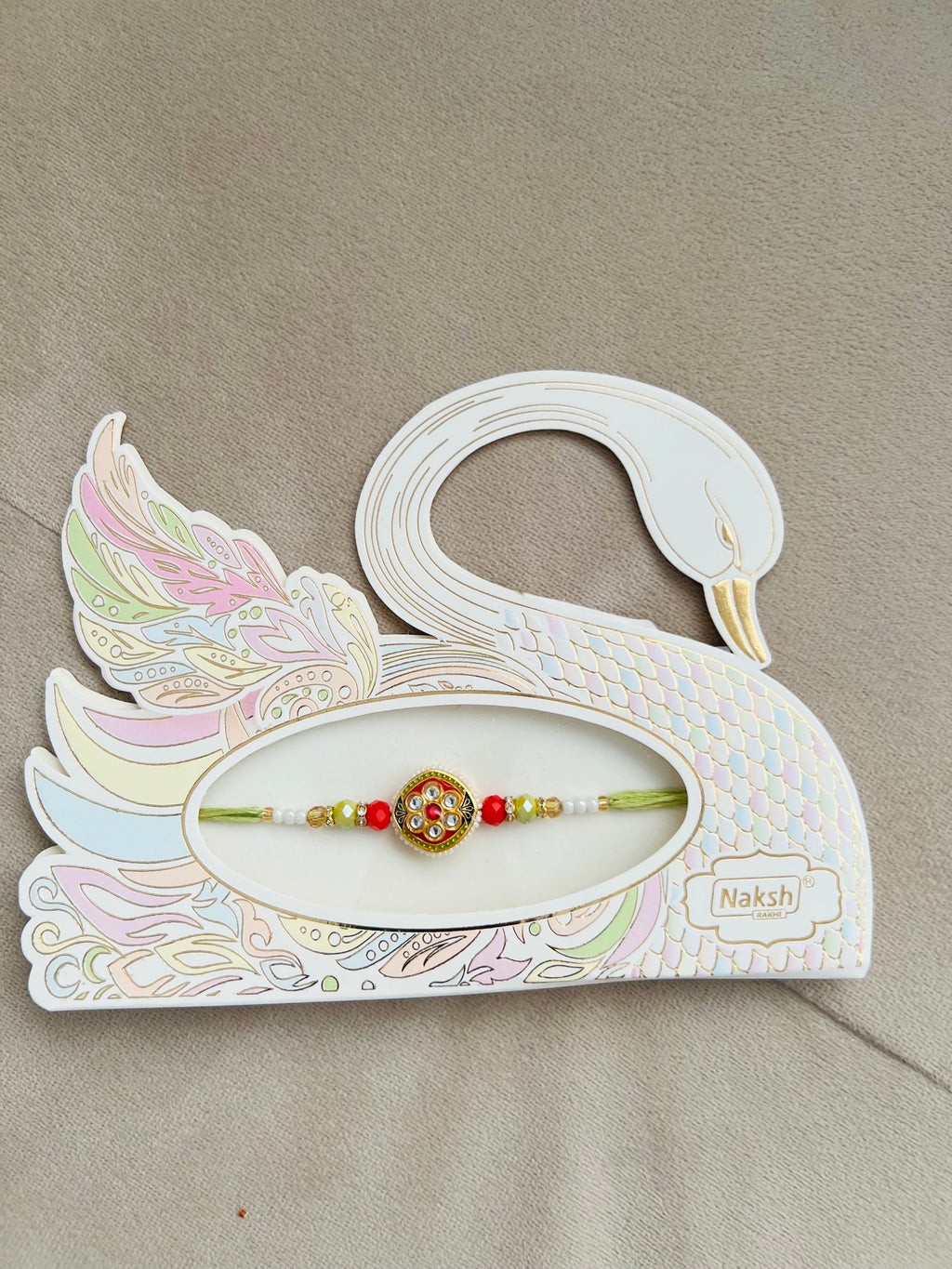 Designer Kundan Rakhi – Intricate Centerpiece, Premium Beads & Swan Gift Card
