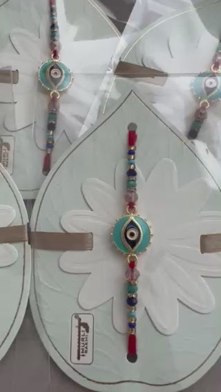 Premium Evil Eye Rakhi – Blue Enamel Pendant, Gold Detailing